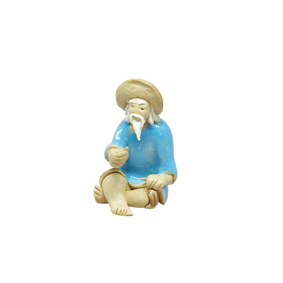 Chinese Figurine - Man Sitting Fishing